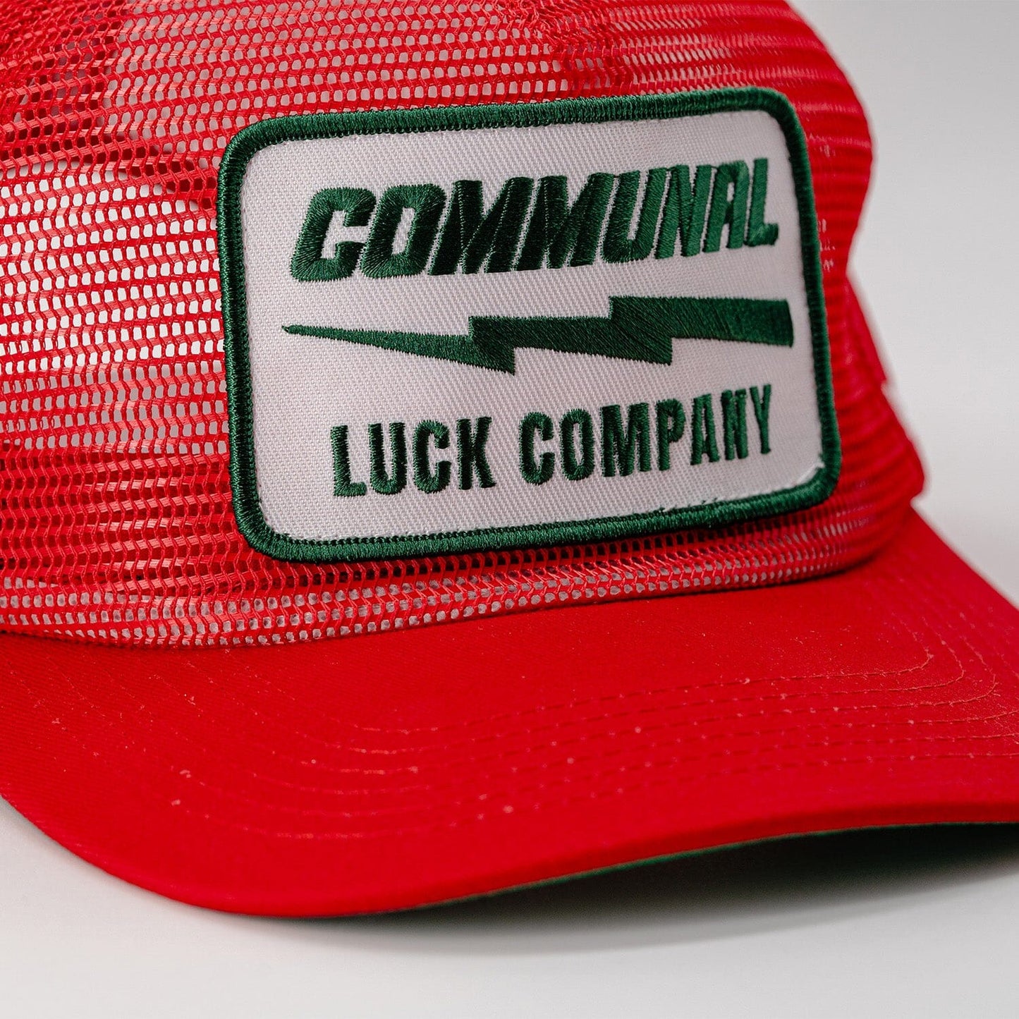 Red All-Mesh Luck Company Hat Patch